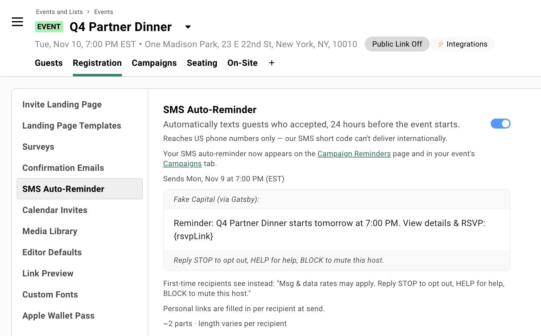 The SMS Auto-Reminder page under the Registration tab for an event called Q4 Partner Dinner, with the toggle switched on, a note that the reminder now appears on the Campaign Reminders page and the event's Campaigns tab, and a line reading Sends Mon, Nov 9 at 7:00 PM (EST). The preview shows the Fake Capital (via Gatsby) prefix, the text Reminder: Q4 Partner Dinner starts tomorrow at 7:00 PM. View details and RSVP, and the Reply STOP to opt out, HELP for help, BLOCK to mute this host footer.
